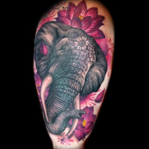 3d elephant and flowers tattoo