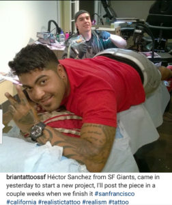 tattooing Hector Sanchez from the San Francisco Giants