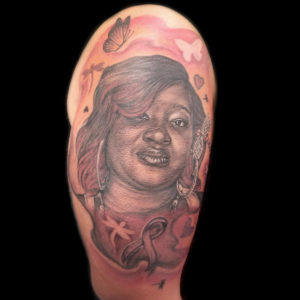 dark skin portrait tattoo