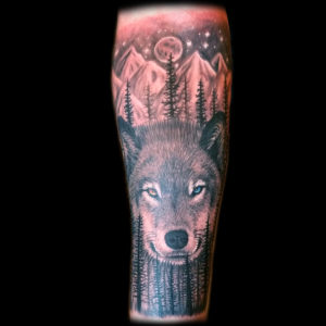 wolf landscape tattoo color eyes
