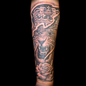 lion crown rose tattoo