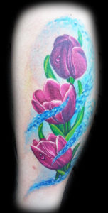 pink flowers tattoo