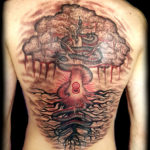 backpiece tree snake tattoo