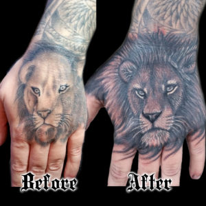 cover up lion tattoo hand