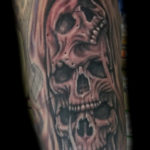 bio skulls smoke tattoo