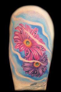 color daisy flowers tattoos