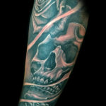 realistic skull and roses tattoo