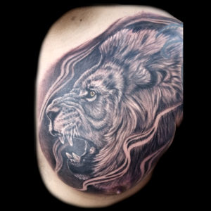 lion chest tattoo