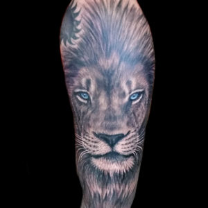 arm lion tattoo