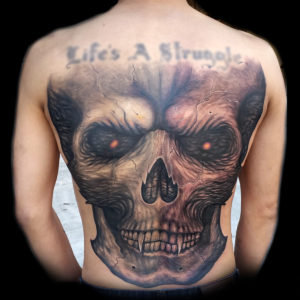 skull back tattoo backpiece