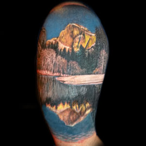father son mountain tattoo