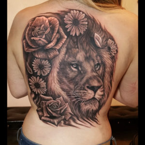 lion backpiece tattoo