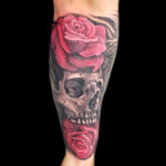 skull red roses tattoo