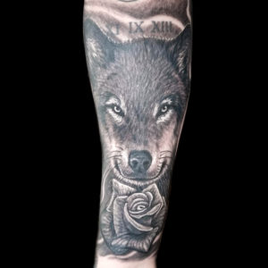 wolf and rose tattoo
