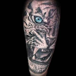 tiger half face tattoo