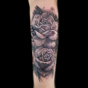 realistic black and grey roses tattoo