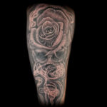 realistic skull rose smoke tattoo black and grey