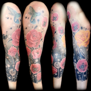 realistic flowers arm sleeve tattoo
