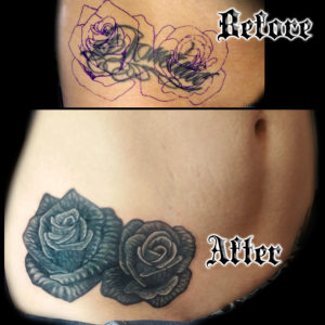 black roses cover-up tattoo