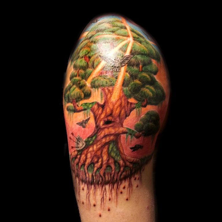 realistic and silhouette trees tattoos done at Masterpiece Tattoo by Brian