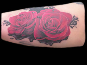 red roses cover up tattoo