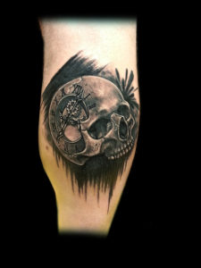 skull clock trash polka tattoo