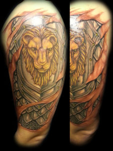 golden lion armor tattoo