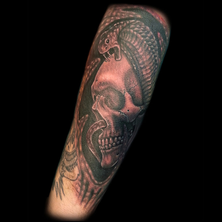 realistic 3d snake tattoo done in San Francisco at