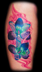 colorful orchids tattoo