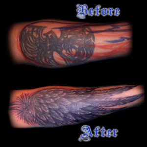 angel wing cover up tattoo